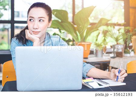 Woman working in a laptop computer 35612193