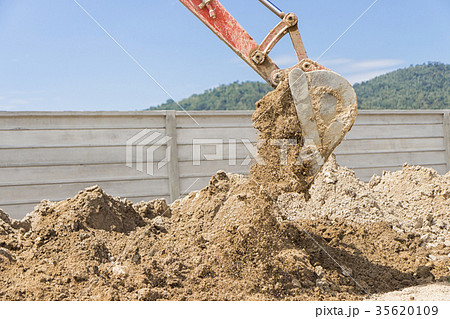Excavator working at construction site 35620109