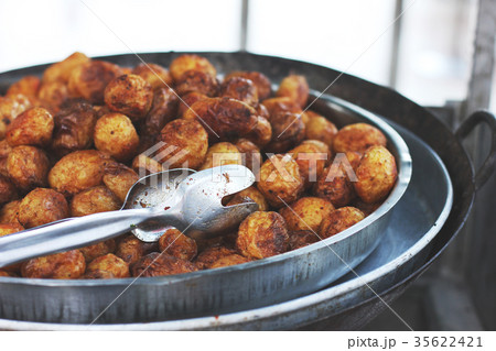 roasted potatoes in the dish 35622421