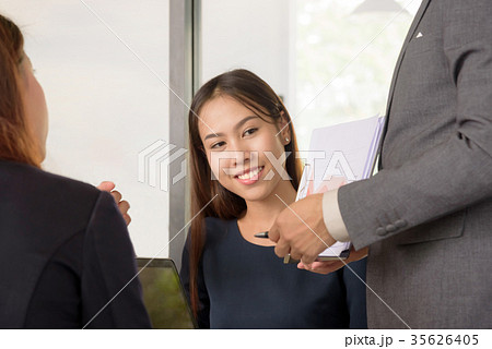 business woman looking at presentation in meeting 35626405