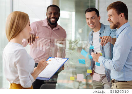 Attentive female person reading her list 35626510