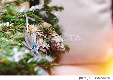 Christmas spruce branches with cones decorations Christmas spruce branches with cones decorations 35628870