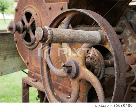 Vintage grain grinder machine. Vintage grain grinder machine. 35630480