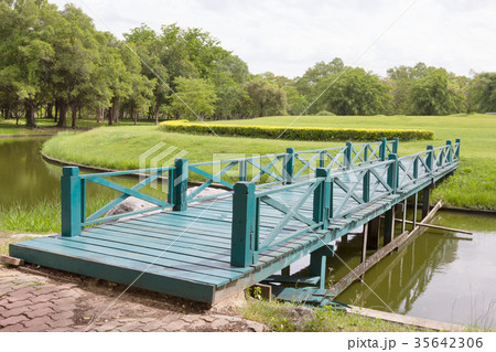 Green Wooden Bridge in Garden Green Wooden Bridge in Garden 35642306