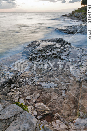Stormy rocky beach sunset on Adriatic Sea 35645191