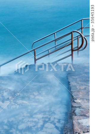 Swim ladder leading to mystic sea 35645193