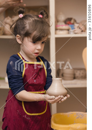 girl in a pottery workshop girl in a pottery workshop 35650896
