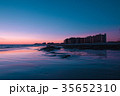 Sunset over a rocky beach in front the hotels 35652310