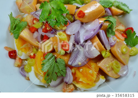 spicy boiled egg and pork sausage with dry shrimp spicy boiled egg and pork sausage with dry shrimp 35658315