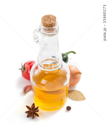 bottle of oil isolated and spices at white bottle of oil isolated and spices at white 35660273