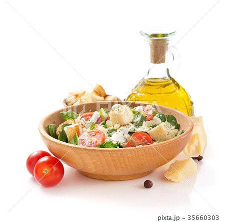 caesar salad in plate on white background caesar salad in plate on white background 35660303
