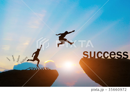 Men jump over silhouette failure to success 35660972