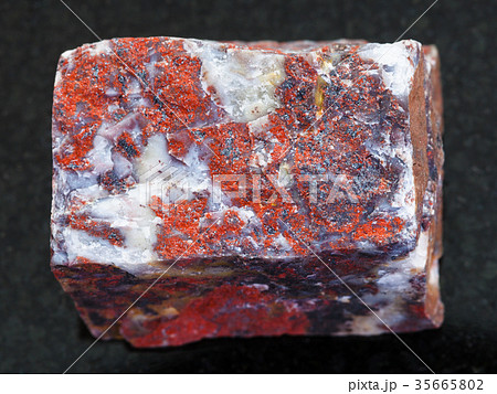 raw Jasper stone on dark background raw Jasper stone on dark background 35665802