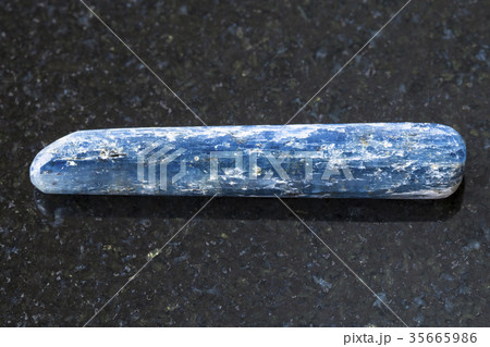 tumbled Kyanite crystal gemstone on dark tumbled Kyanite crystal gemstone on dark 35665986