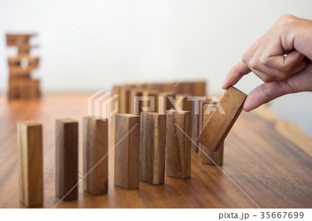 Risk and strategy in business, Close up of businessman hand gamb Risk and strategy in business, Close up of businessman hand gamb 35667699