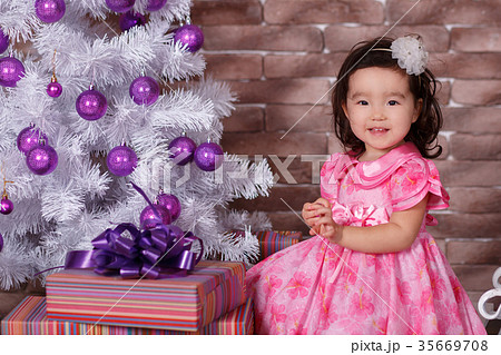 Asian little cute girl wearing pink casual dress Asian little cute girl wearing pink casual dress 35669708