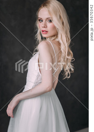 Portrait of a beautiful blond girl bride 35670342