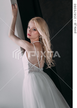 Portrait of a beautiful blond girl bride 35670360