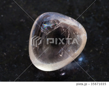 polished smoky quartz gem stone on dark polished smoky quartz gem stone on dark 35671035