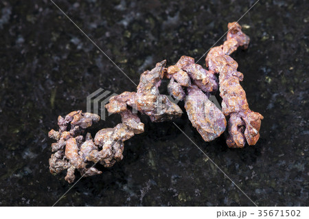raw native copper on dark background 35671502