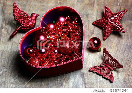 christmas red ball in a box shape heart 35674244