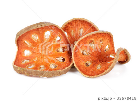 Aegle marmelos. Dry bael fruit on white background Aegle marmelos. Dry bael fruit on white background 35678419