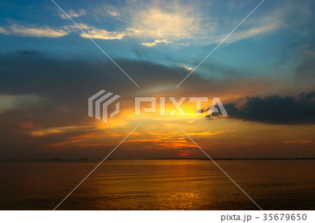 The sky and the lake in the twilight after sunset. 35679650