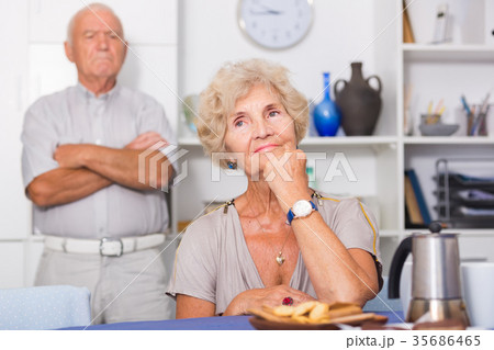 Elderly upset woman having problems in relationship with husband 35686465