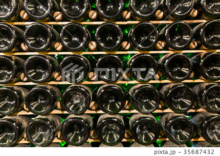 Racks with bottled wine in plant storage 35687432