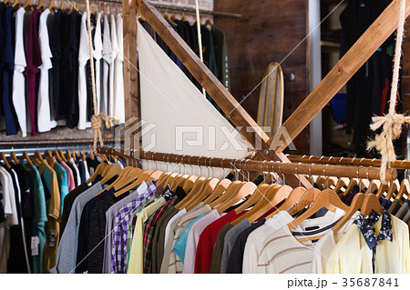 Different assortment of colorful clothing in boutique Different assortment of colorful clothing in boutique 35687841