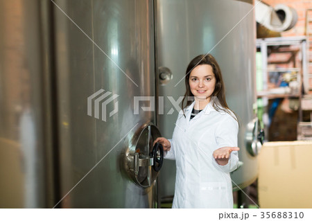 Operator in olive oil factory. 35688310