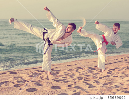 boy and a teacher are practicing karate 35689092