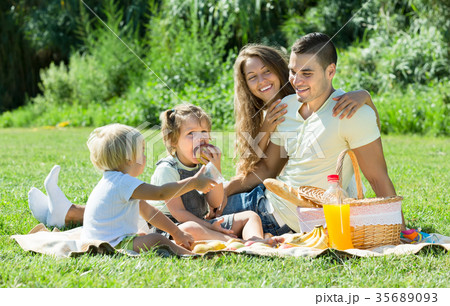 Family of four on picnic 35689093