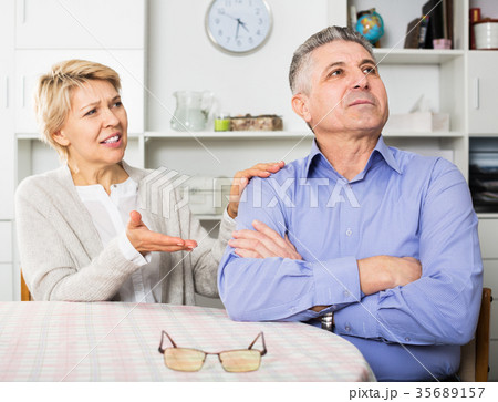 Mature couple quarrels Mature couple quarrels 35689157