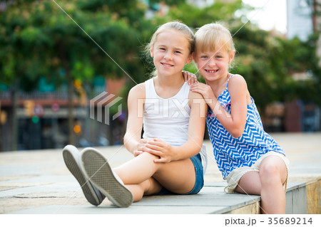 Portrait of two girls in summer day Portrait of two girls in summer day 35689214