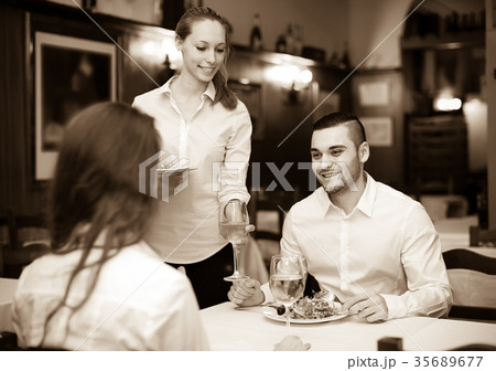 Couple eating healthy food in restaurant Couple eating healthy food in restaurant 35689677