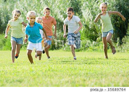 children running in park 35689764