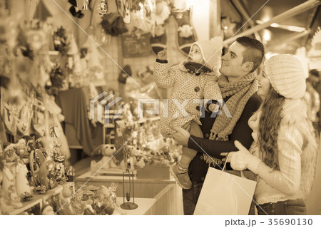 Happy family at Christmas market Happy family at Christmas market 35690130