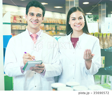Young team in chemist shop Young team in chemist shop 35690572