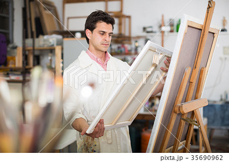 Artist painting on canvas Artist painting on canvas 35690962
