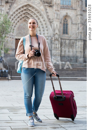 Girl tourist is walking Girl tourist is walking 35691028
