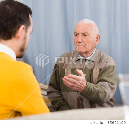 Father and son arguing Father and son arguing 35691109