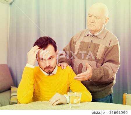 Father and son arguing 35691596