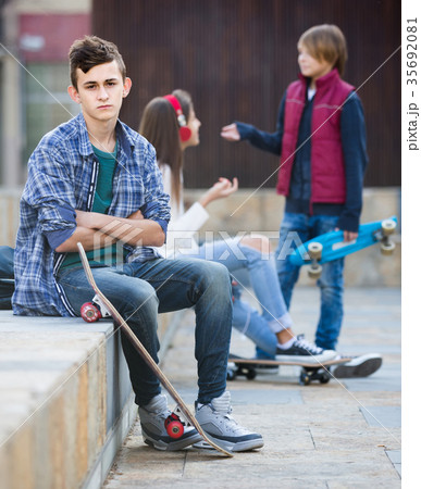 Jealous teen and his friends after conflict 35692081