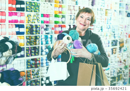 Client is standing with purchases 35692421