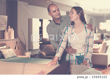 Adult couple choosing furniture for apartment 35693102