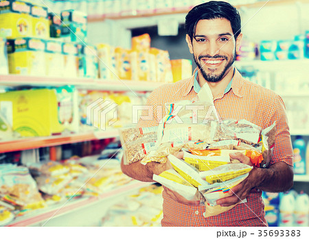 customer who is standing with purchases customer who is standing with purchases 35693383