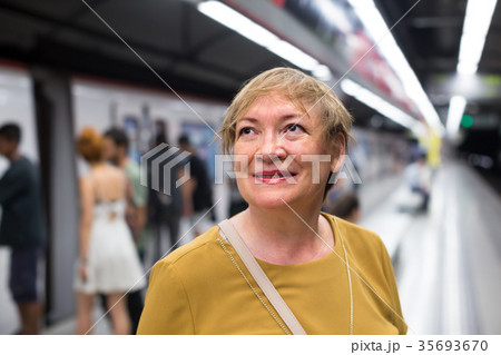 female passenger riding underground female passenger riding underground 35693670