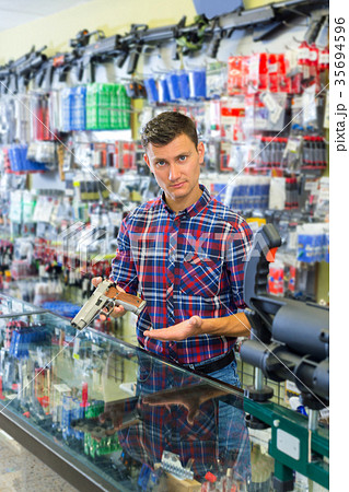 Salesman displayed variant of air weapon Salesman displayed variant of air weapon 35694596