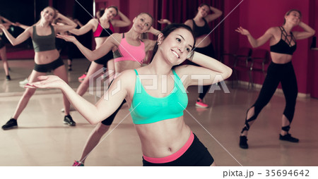 Women dancing in class 35694642